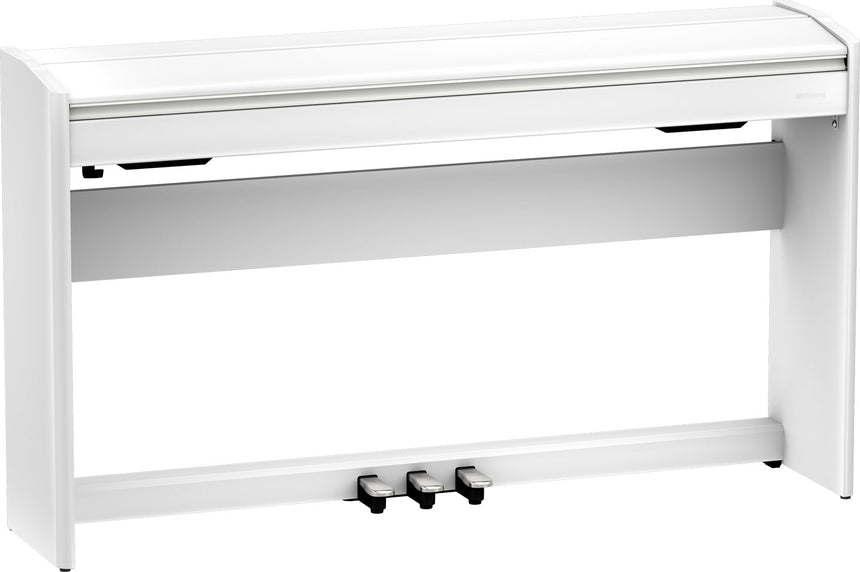 Roland F-701 digital piano in matte white – three-quarter view with keyboard lid closed