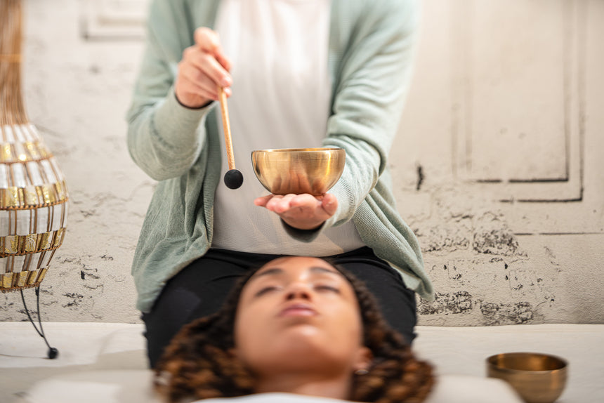 MEINL Sonic Energy SB-PM-SR-S small soft-rubber mallet, at a singing bowl in the foreground