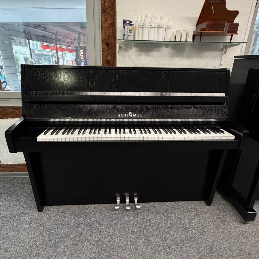 SCHIMMEL Klavier 112/5 E eiche schwarz Occasion Bj. 1989, Silver Edition, sehr guter Zustand Renner Mechanik (gebraucht)