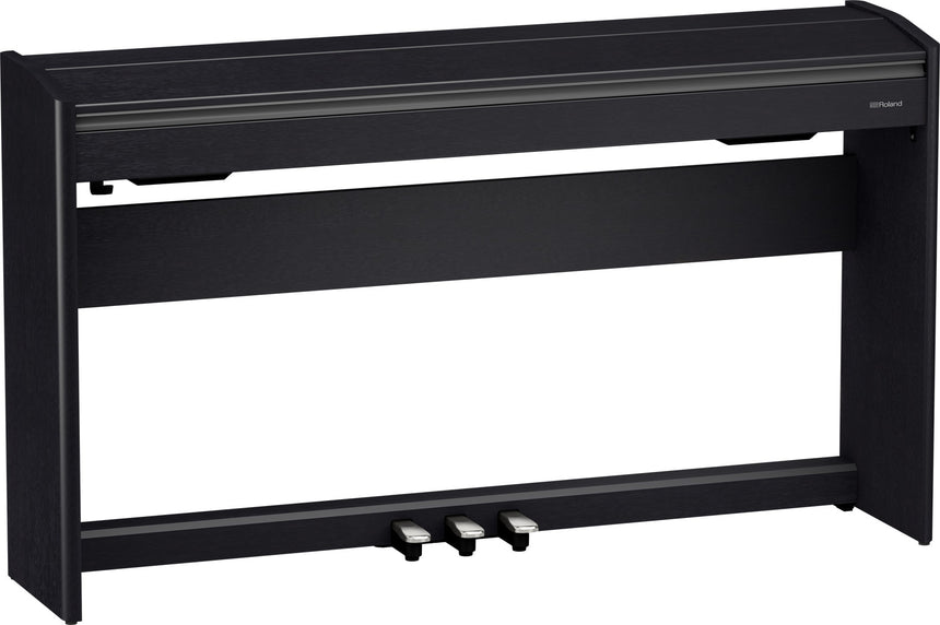 Roland F-701 digital piano in matte black – three-quarter view with keyboard lid closed