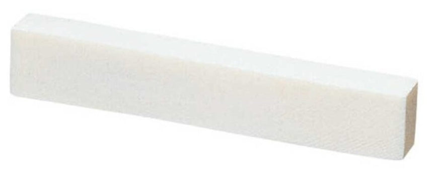 Ébauche de sillet de tête en os GEWA 547000 pour guitare classique, vue oblique.