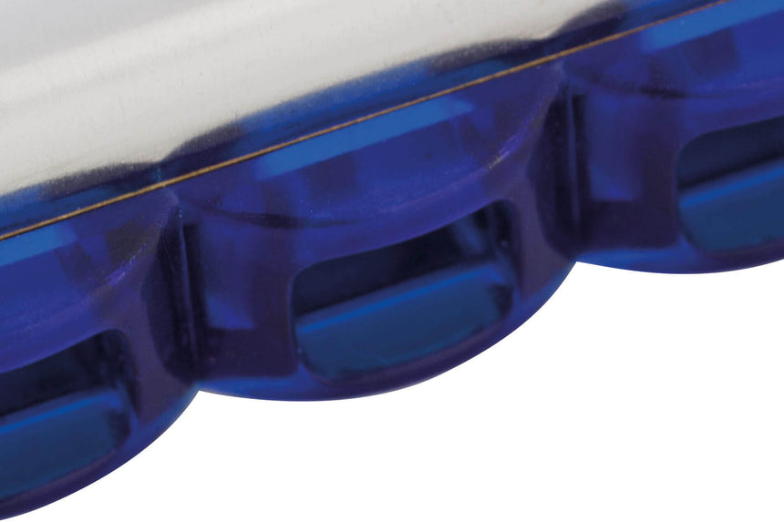 Hohner Melody Star C major harmonica, close-up of holes in the blue mouthpiece